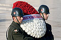 Turkish service members carry a wreath.JPG